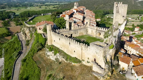 Aerial view of the medieval urban village of Frias, crowned by the Velasco castle (known as Frias Castle) and the church of San Vicente, in Burgos, Spain.
