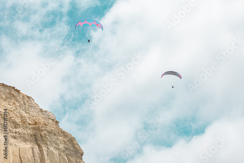 Paraglider flying high over Torrey Pines San Diego California 2025