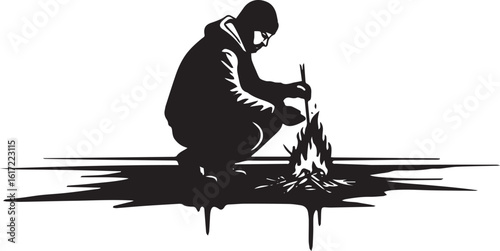Monochrome silhouette of a man building a campfire for warmth in