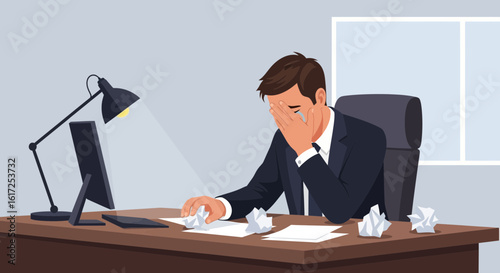 Overwhelmed Professional Man Experiencing Frustration with Crumpled Paper at the Desk