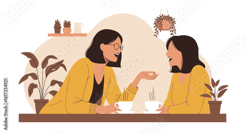 Two Young Women Chatting And Enjoying Coffee In A Cozy Cafe