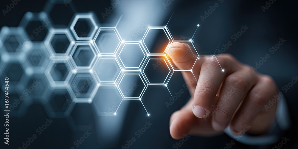 Fototapeta premium A hand interacting with a digital honeycomb network