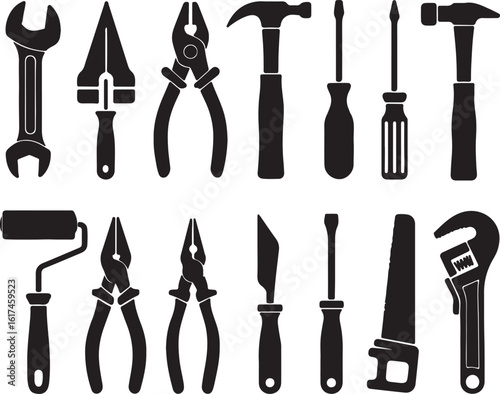 Assorted black silhouette tools for construction and repair wrench trowel