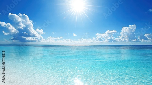 Sunny tropical beach, clear turquoise ocean, bright sky, white clouds, summer vacation