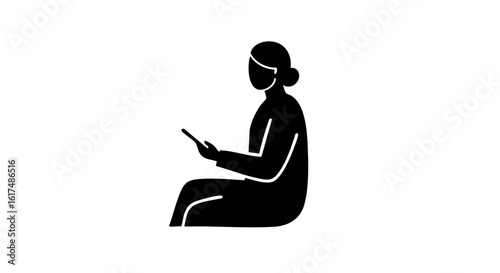 A woman absorbed in her phone.