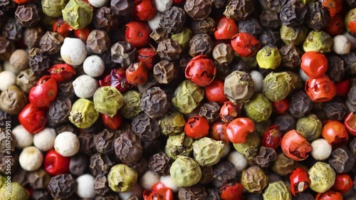 black red white green and allspice mix peppercorn background