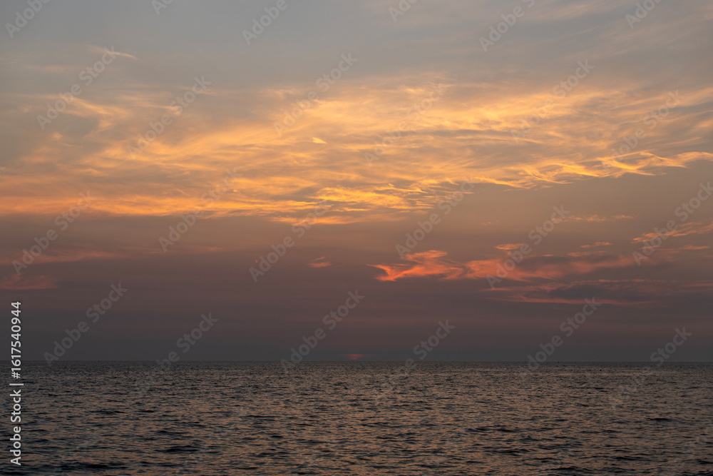 Naklejka premium tranquil seascape after sunset