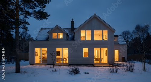 Modern Home Exterior at Dusk in Winter