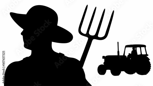 Silhouette of a farmer with a hat and pitchfork standing next to a tractor in a field scenery shot