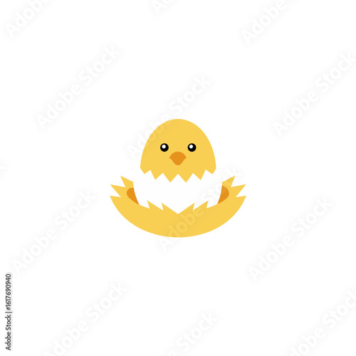 chick hatching from speckled egg on straw nest