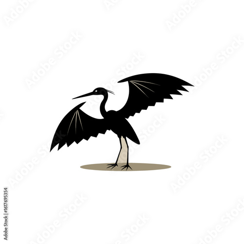 black heron hunting under its wing shadow umbrella