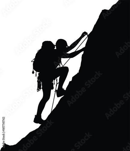 Silhouette of person climbing steep rock face mountain