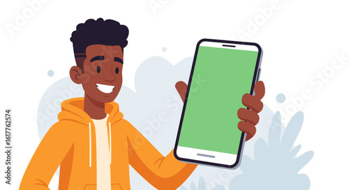 Happy young man showing smartphone with green screen, perfect for app demos or website mockups.