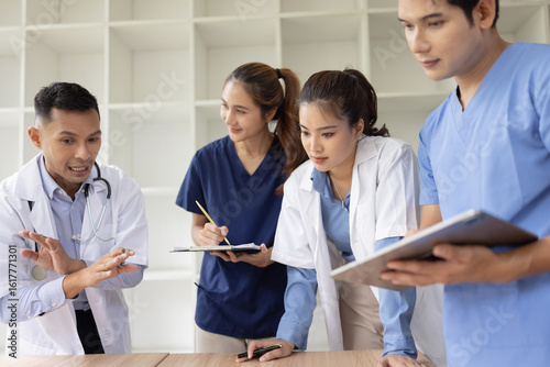 Medical team brainstorming having a meeting in conference room at hospital, Medical technology and health care concept.