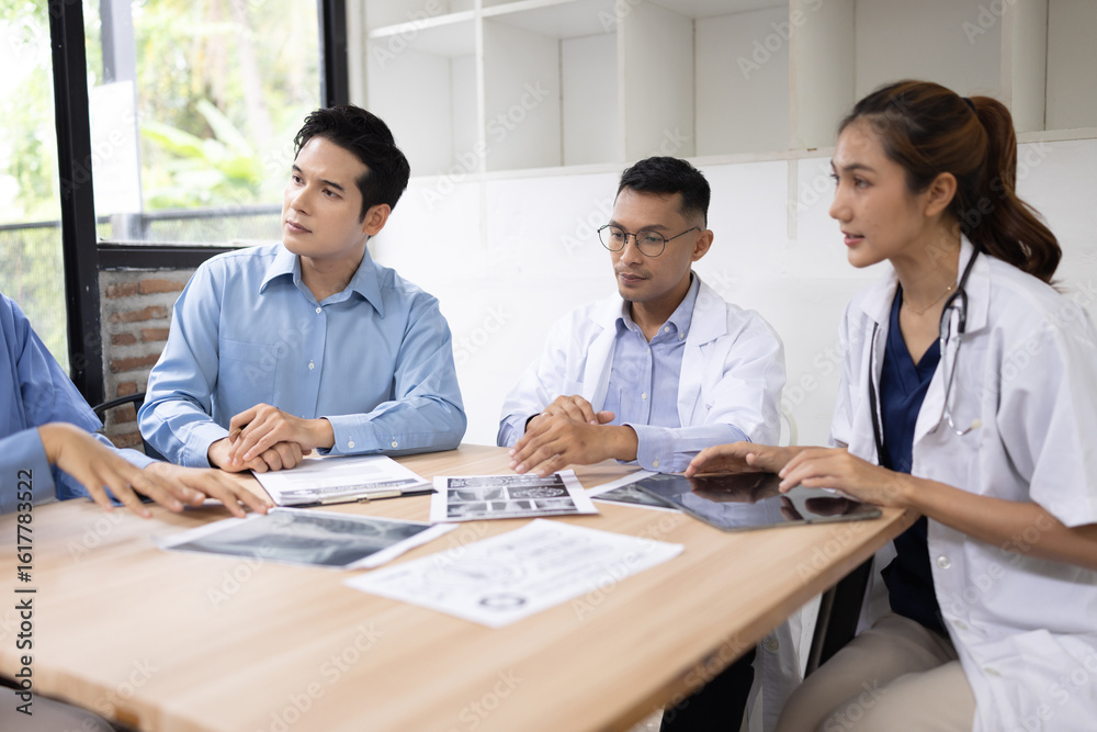 Medical team having a meeting in conference room at hospital, Medical technology and health care concept. Medical team having a meeting in conference room at hospital, Medical technology and health care concept.