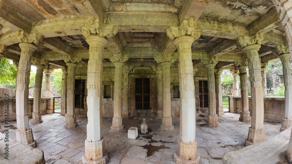 Fototapeta premium Small Heritage Temple in Chittorgarh Fort Complex with Traditional Stone Architecture