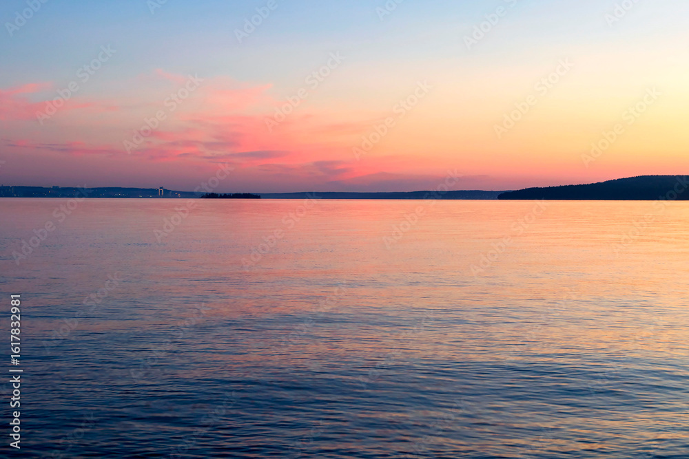 Fototapeta premium Evening sky-water calm landscape of the large Onega Lake in Karelia.