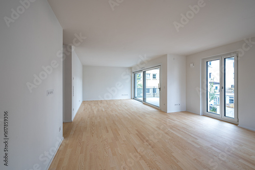 Interior shot of the unfurnished living room of a modern apartment