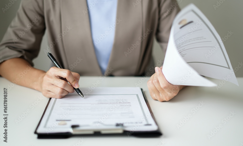 Business woman employer holding resume hiring recruit looking cv resume to hire candidates, analyzing information before job interview. Recruitment concepts Business woman employer holding resume hiring recruit looking cv resume to hire candidates, analyzing information before job interview. Recruitment concepts