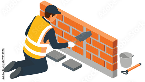 A construction worker building a brick wall with a trowel and wearing safety vest and a cap on a construction site