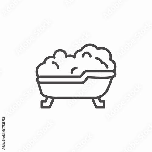bathtub with bubbles icon sign vector