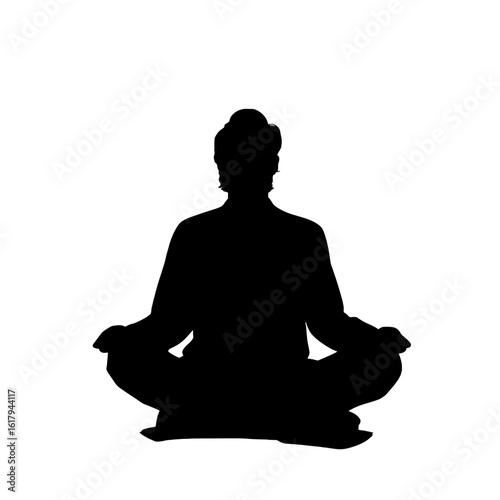 Silhouette of a person meditating in lotus position.
