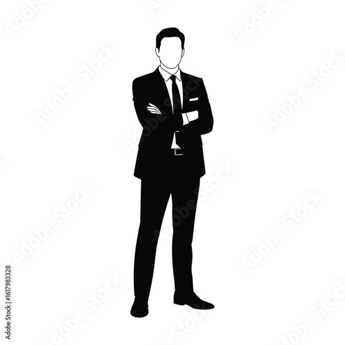 Confident businessman standing with arms crossed in a suit