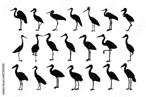 Heron Silhouette Collection: An artful assemblage of elegant heron silhouettes, showcasing their iconic form in various poses and positions, ideal for design projects.