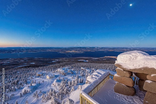 Snowy mountaintop vista at twilight
