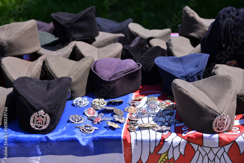 Serbian national hats and other symbols on the market stall