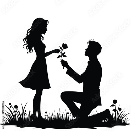 Couple proposal with rose in grassy field flower