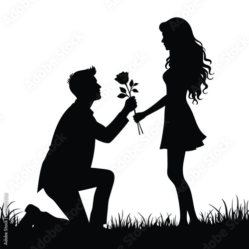 Man proposing with rose to woman in silhouette couple proposal
