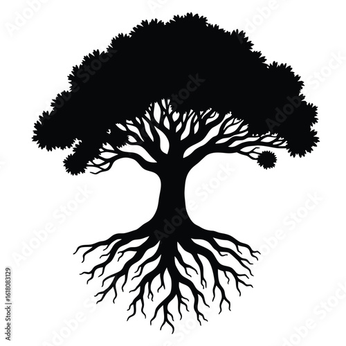 Majestic tree silhouette with sprawling roots and leafy canopy black white