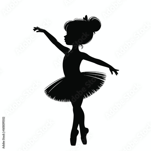 Silhouette of a young ballerina in a graceful dance pose