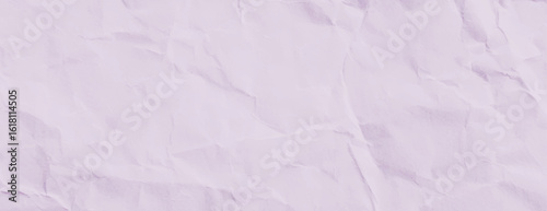 A crumpled paper background with a soft pink color. The pink background has a textured, wrinkled appearance, adding depth and interest. Paper texture background vector. Pink background.