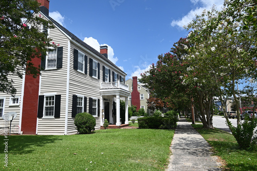 Quaint old house and sidewalk in the suburbs