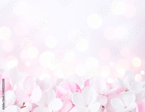 Soft Pink and White Bokeh Lights on Gentle Pastel Background

