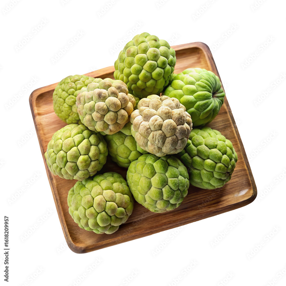 Fototapeta premium Fresh Custard Apples Displayed on a Rustic Wooden Tray, TopDown View