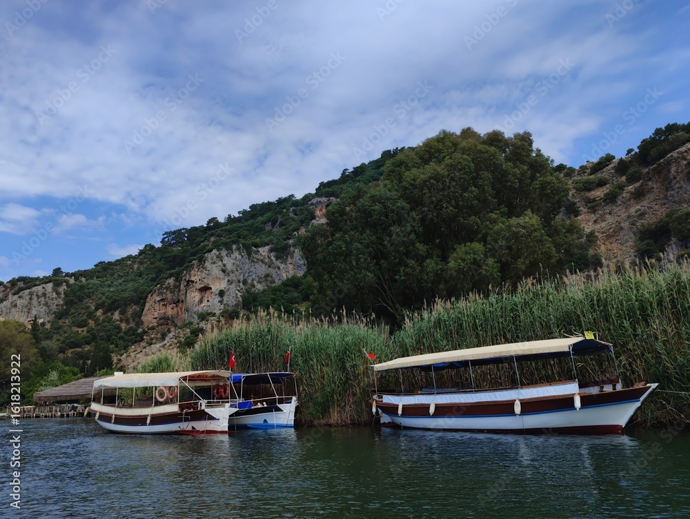 Naklejka premium Beautiful bright nature photo image of marina yacht club boat in the sea with blue sky ultra high quality resolution wallpaper banner poster 