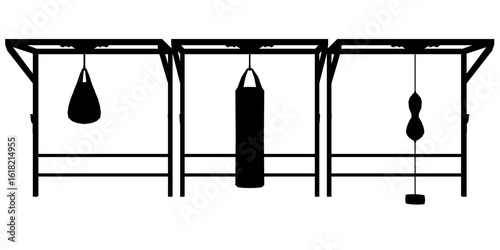 Three black and white punching bags hang in a triangular formation from a curved metal stand. The central bag is largest, flanked by two smaller ones, creating a striking polygonal silhouette.
