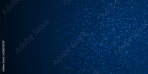 Glowing blue particles scattered across dark gradient background, creating a light burst effect ideal for tech
