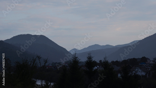 Morning on the mountain slopes and clouds, landscape of the Carpathians