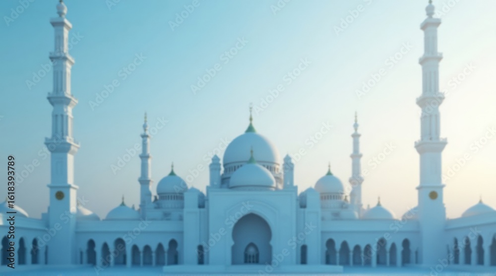 Fototapeta premium White Mosque with Multiple Domes and Minarets in Bright Daylight