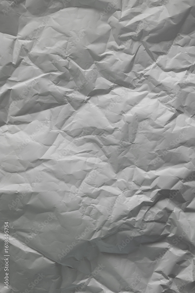 Fototapeta premium Crumpled White Paper Texture in Natural Light as a Background