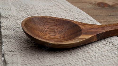 Wooden Spoon on Linen Cloth, a Rustic Kitchenware Item for Cooking and Serving