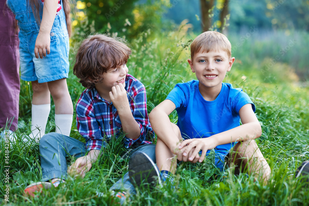 Fototapeta premium Children spending time in nature on summer day