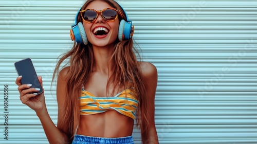 Young Woman Enjoying Music Outdoors With Headphones and Smartphone on a Sunny...