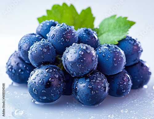 Wallpaper Mural Fresh blueberries glistening with water droplets, surrounded by vibrant green leaves on a reflective surface, highlighting their natural beauty and freshness in a visually appealing arrangement Torontodigital.ca