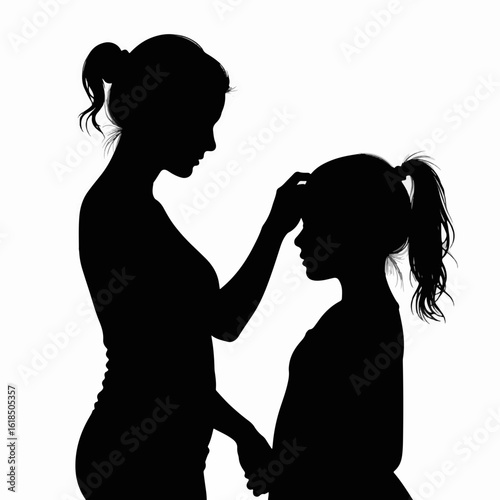 Mother combing daughter's hair in silhouette against white background. Tender moment showcases mother caring for child while styling hair.