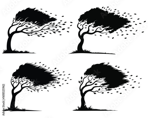 Four black silhouette trees bending in wind with falling leaves